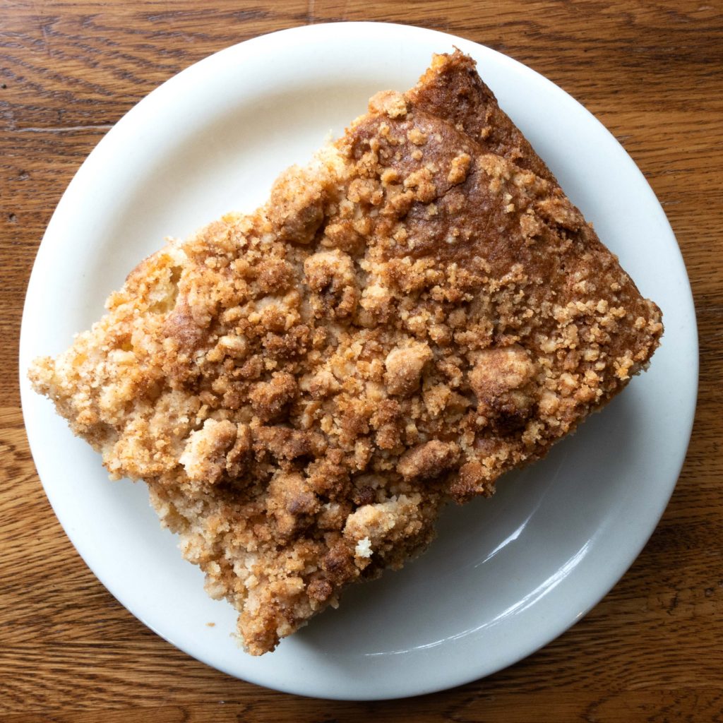 A coffee cake from Coffee Break shot over a wooden background