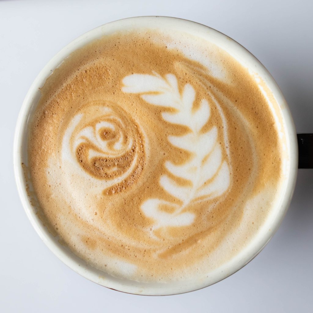 A Coffee Break Latte sitting on a white background